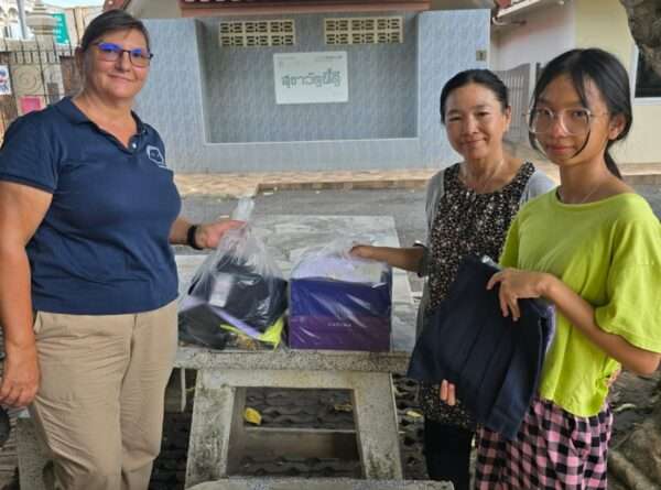 Helping Aui and her daughter