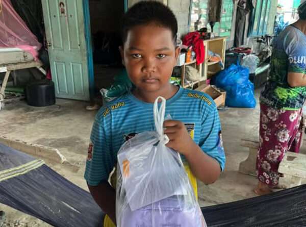 Helping Fahud with school uniforms