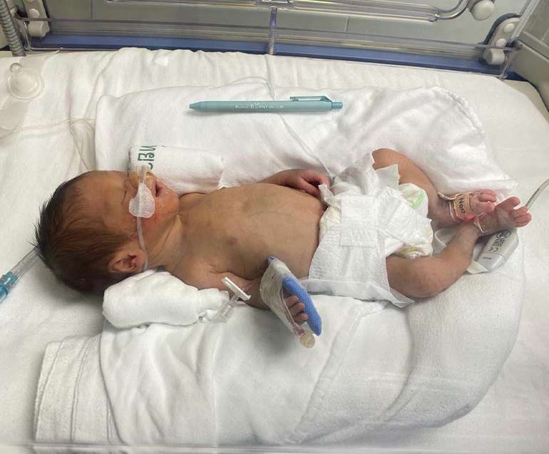 Helping a little baby girl